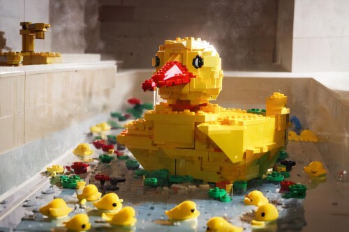 13172-60233162-LegoAI_yellow_duck-afloat-in-bathtub-masterpiece_1.3-best_quality_1.3-ultra_detailed_1.3-8k-extremely_clear-reali.jpg